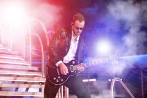 Mango's Orlando Welcome Orange County Convention Goers mangos guitarist 300x200 - Mango's Orlando Welcome Orange County Convention Goers