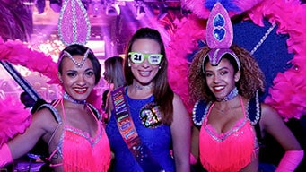 Birthday girl hosts birthday party in Orlando. Poses with 2 samba dancers from Mango’s Tropical Cafe Dinner Shows in Orlando.